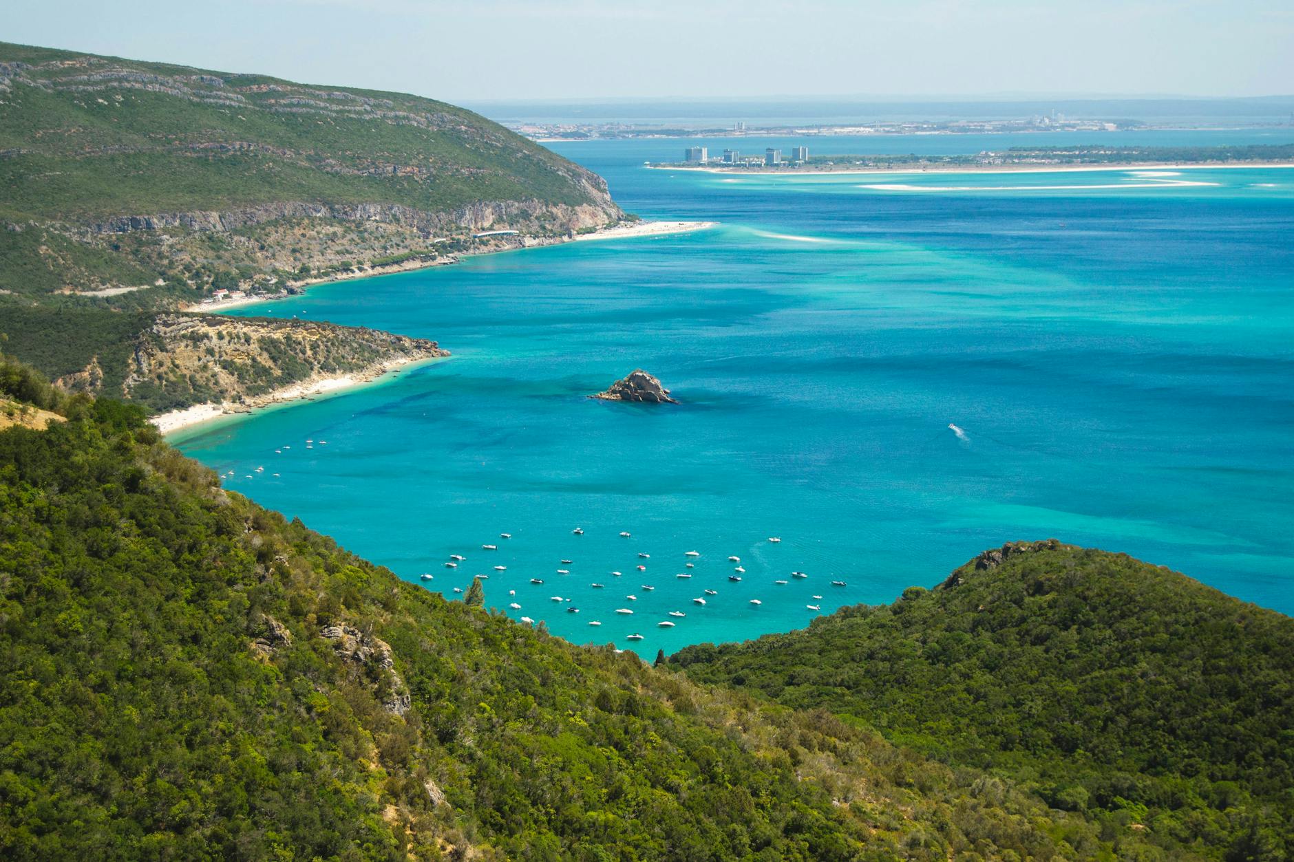 Turquoise waters of Arrábida Natural Park beach near Setúbal Portugal
