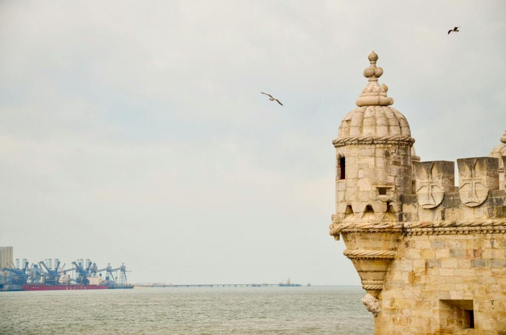 Scenic view of the historic Belém Tower by the Tagus River in Lisbon, Portugal - a UNESCO World Heritage Site