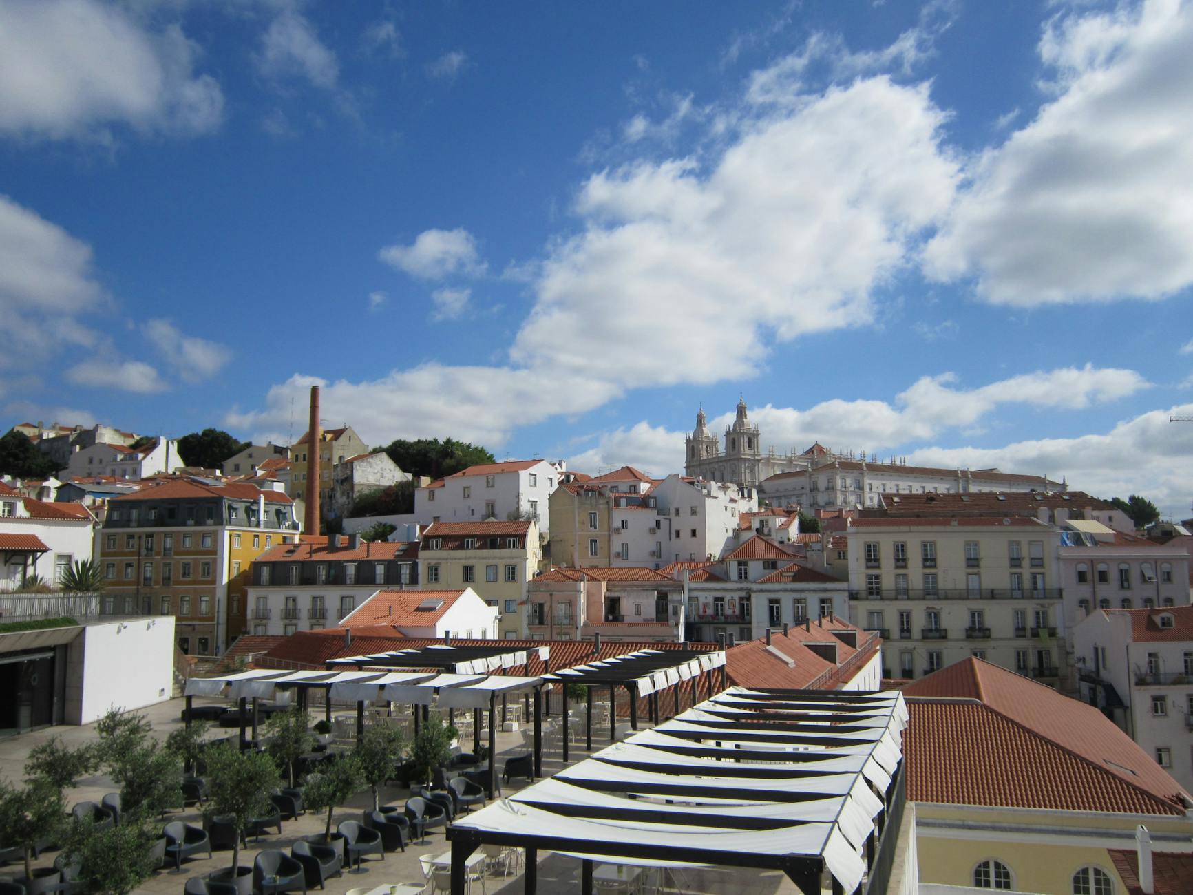 Lisbon's safe and friendly streets in Alfama with locals and tourists walking