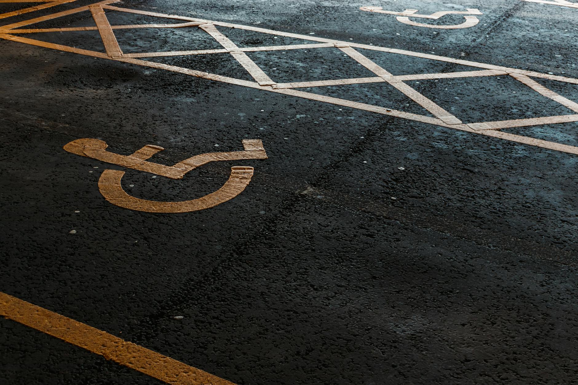 Wheelchair user navigating an accessible flat plaza in central Lisbon