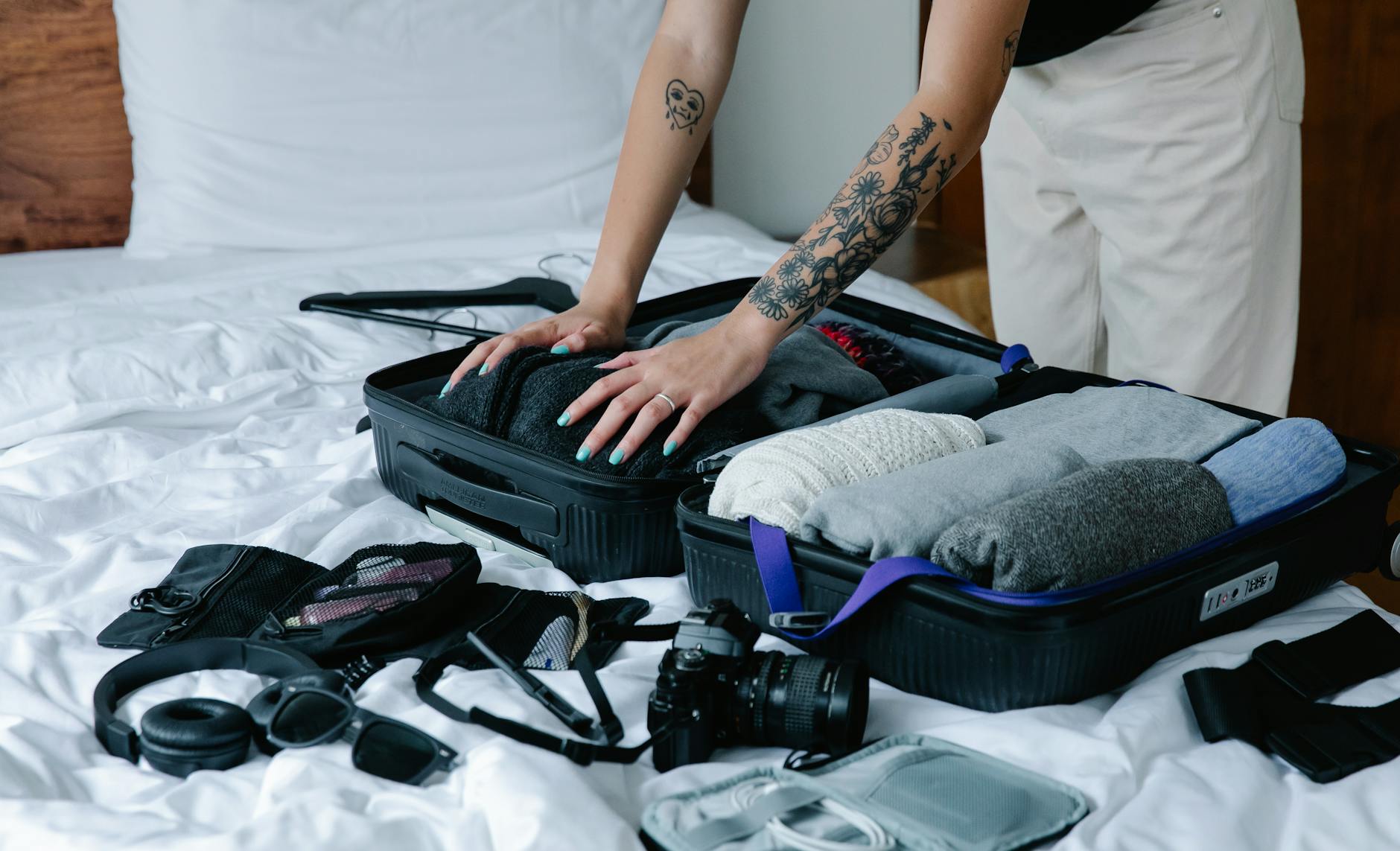 Travel essentials for a Lisbon trip including walking shoes