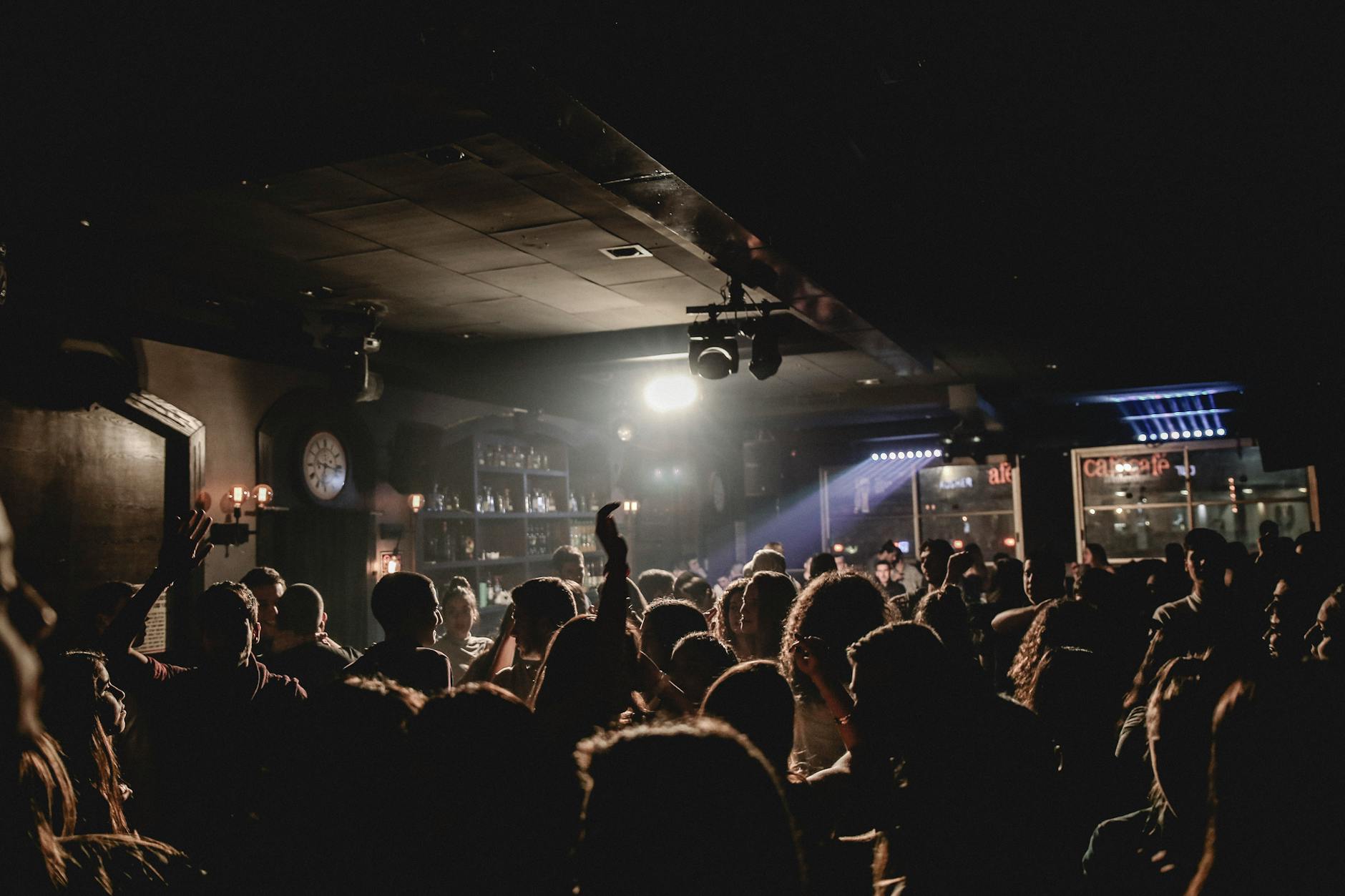 Nightclub dance floor with lights and crowd Lisbon clubbing scene