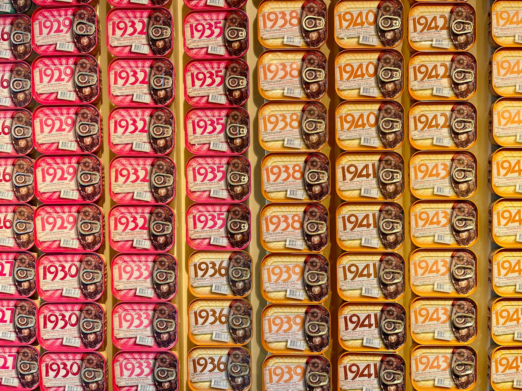 Colorful retro-style Portuguese canned sardine tins displayed in a Lisbon souvenir shop