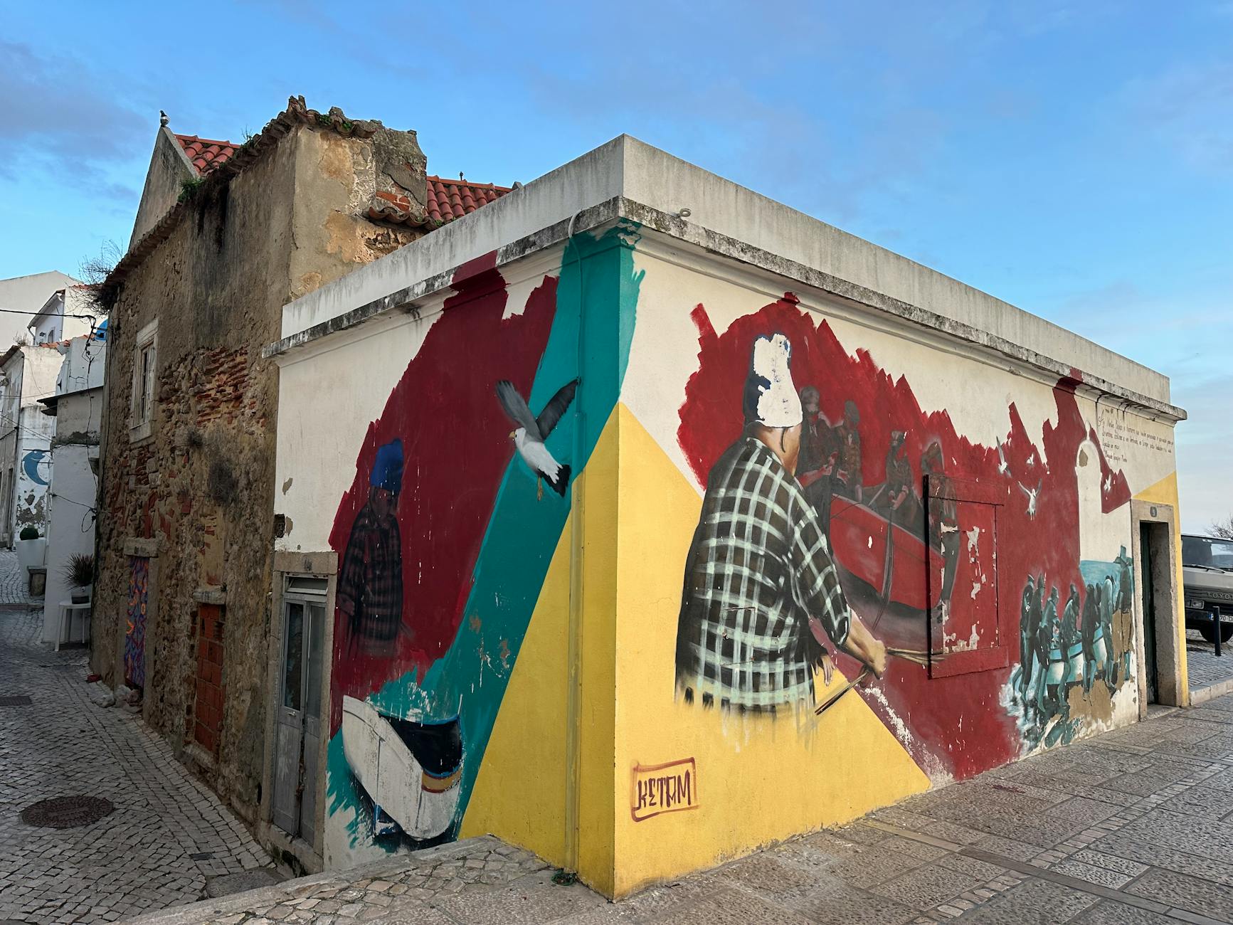 Colorful street art mural in Lisbon showcasing urban art and culture