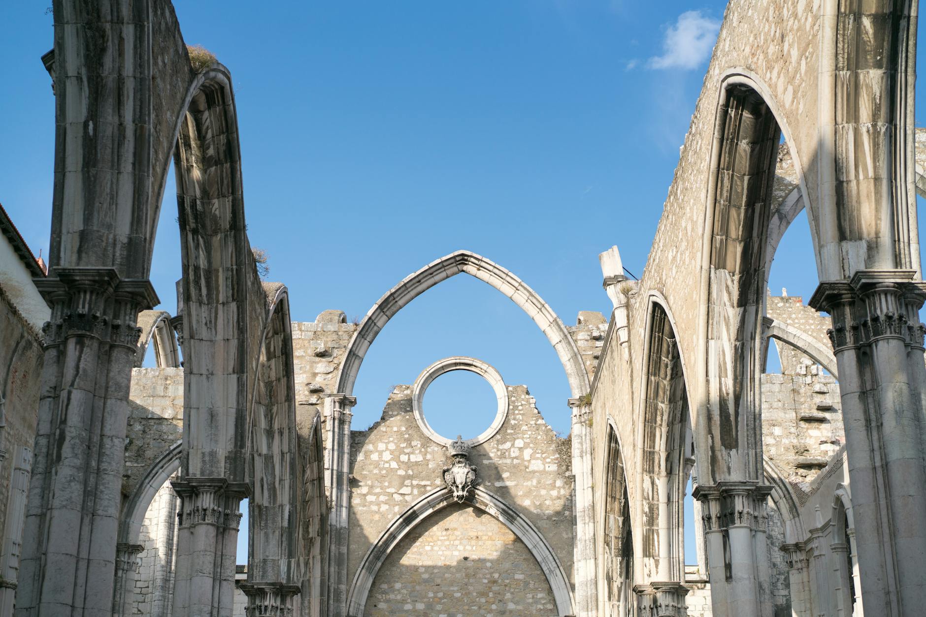 Ruined Gothic arches of Carmo Convent in Lisbon, destroyed in the 1755 earthquake, open to the sky