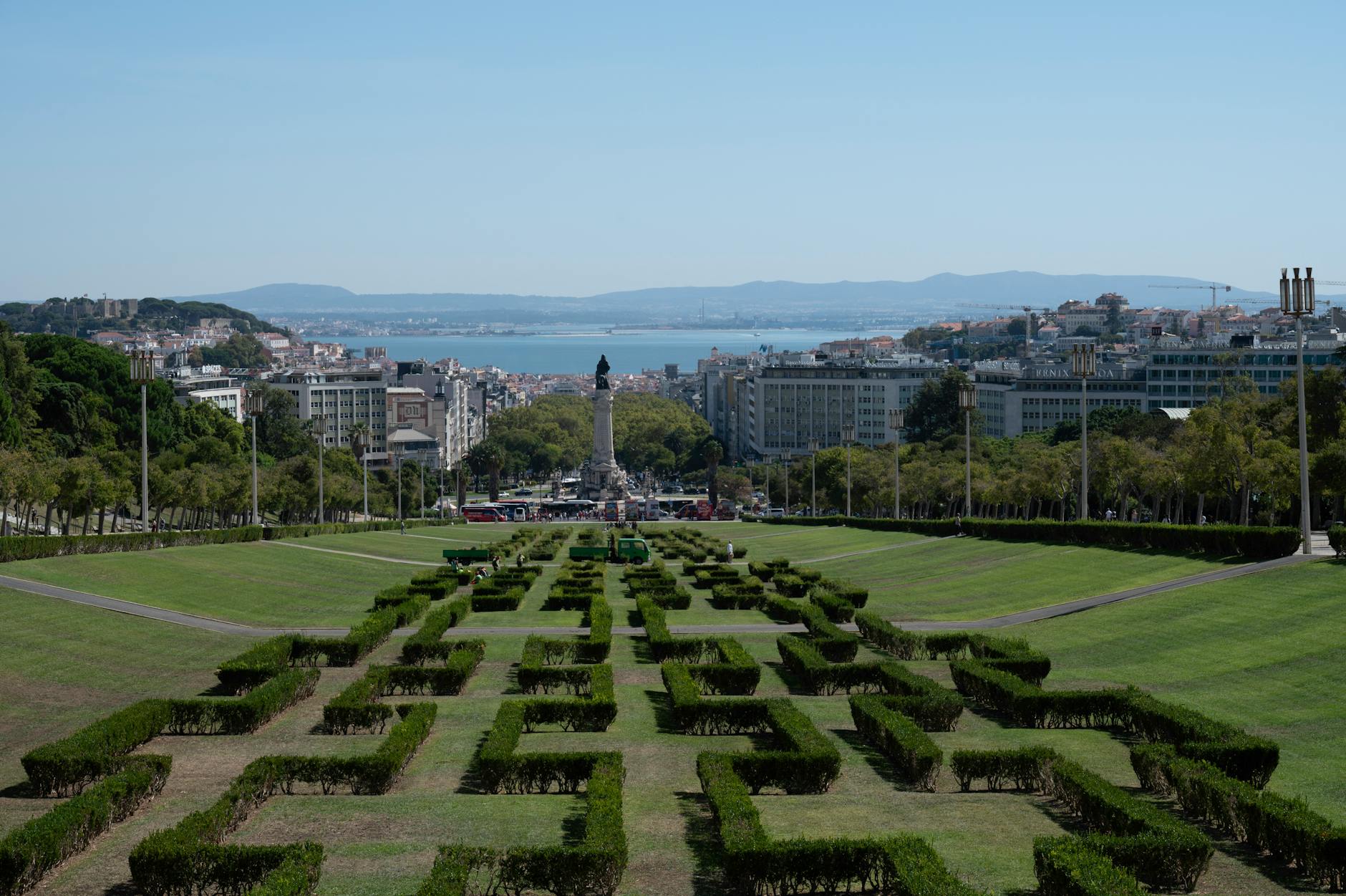Aerial view of Eduardo VII Park and Avenida da Liberdade in Lisbon stretching toward the Tagus River