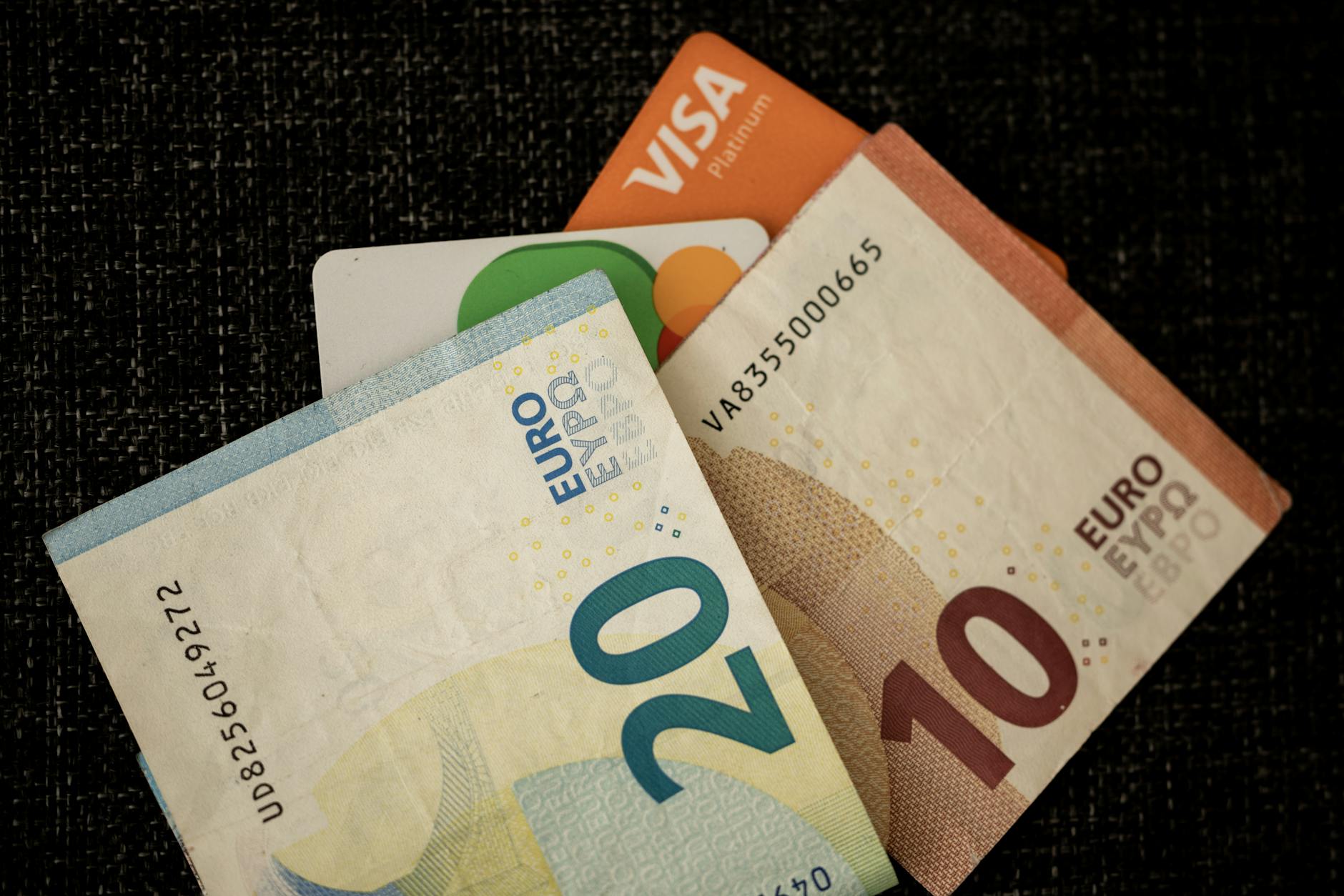 Euro banknotes and credit cards for money use in Lisbon