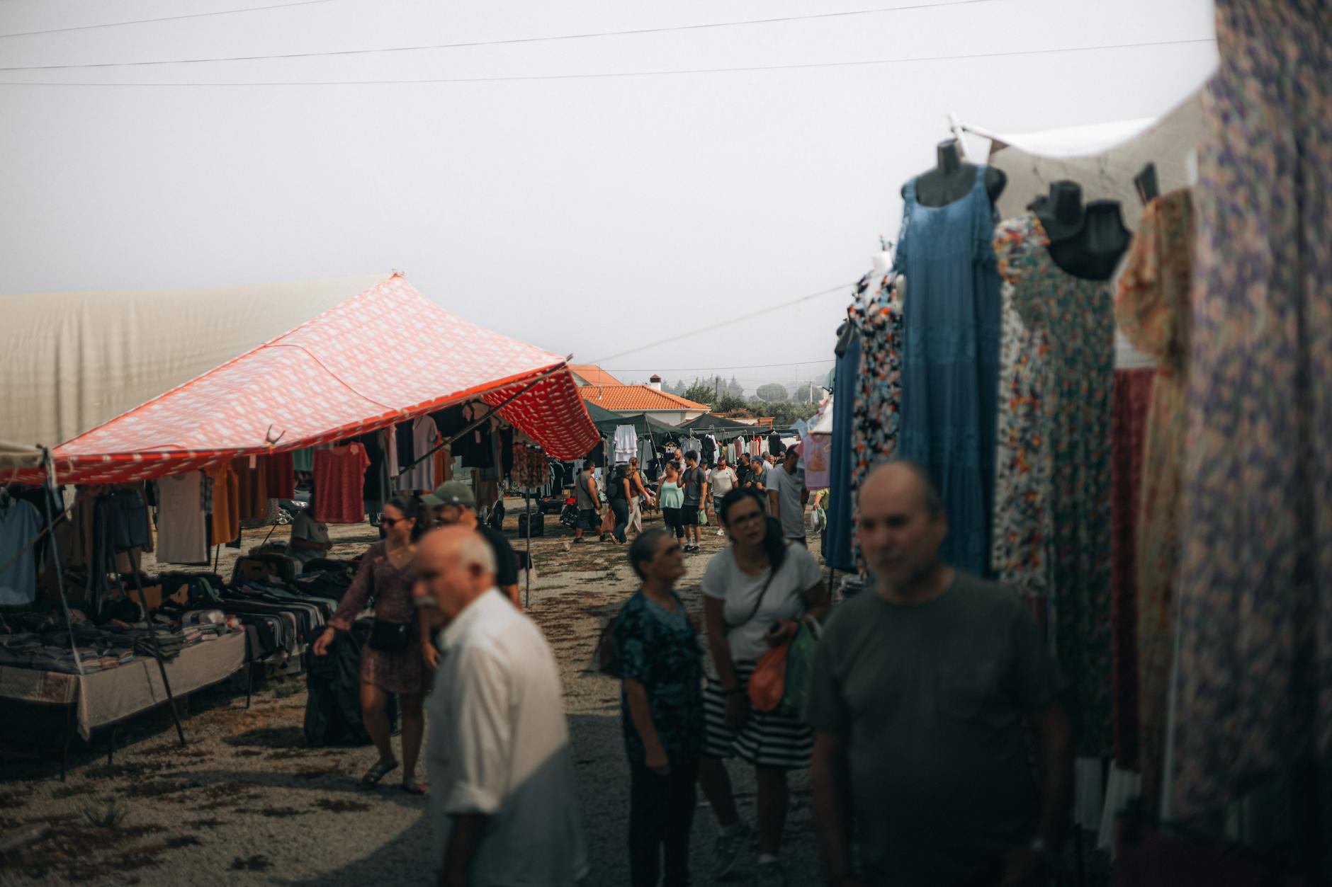 Feira da Ladra flea market stalls Lisbon vintage clothing