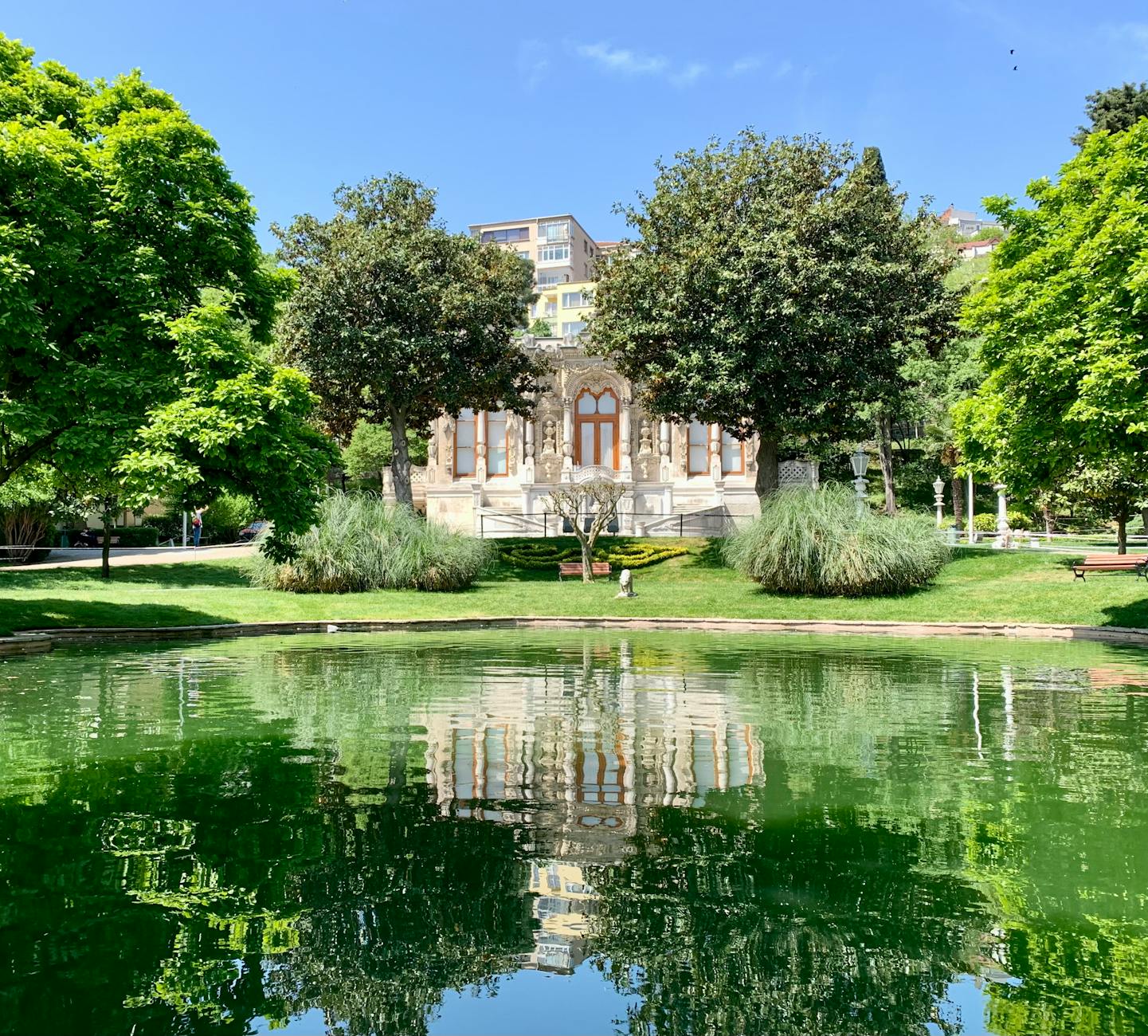 Gulbenkian Museum Lisbon building reflected in the park gardens pond