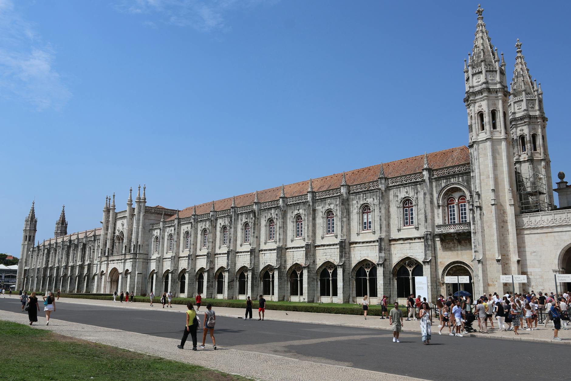 Jerónimos Monastery Gothic architecture exterior Lisbon Belém under blue sky