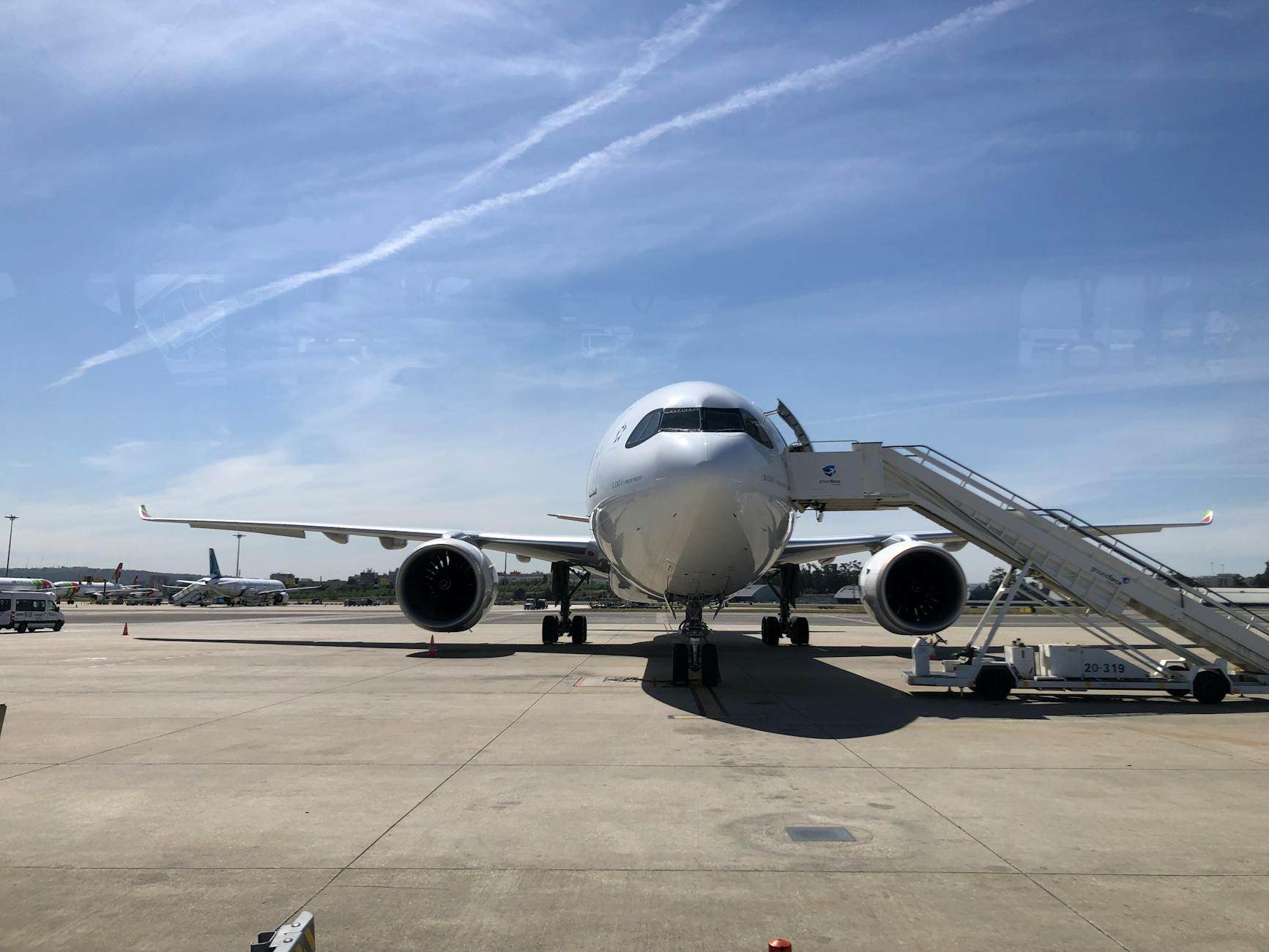 Commercial airplane on runway at Lisbon Humberto Delgado Airport