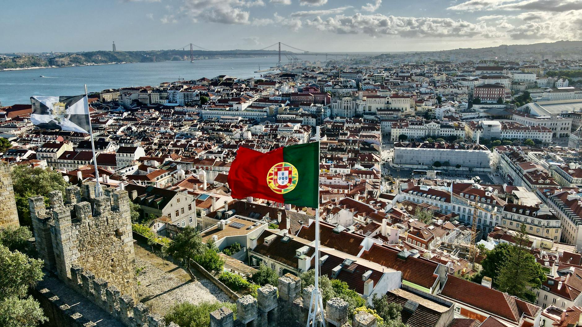 Aerial view of Lisbon cityscape from São Jorge Castle on a sunny day