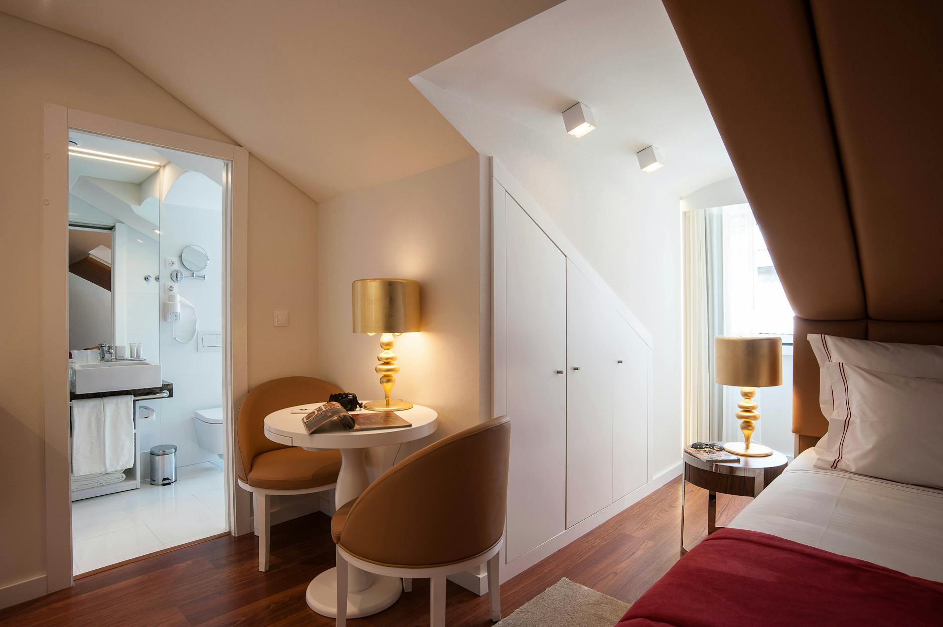 Stylish modern hotel room with warm lighting in Lisbon