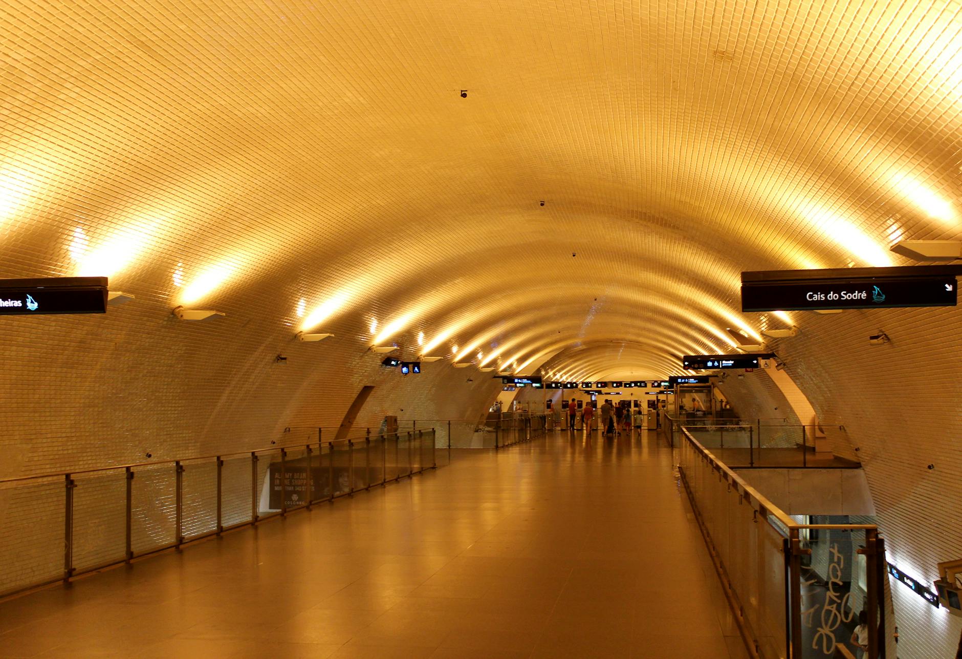 Arched corridor in Lisbon Metro station with elegant tiled architecture
