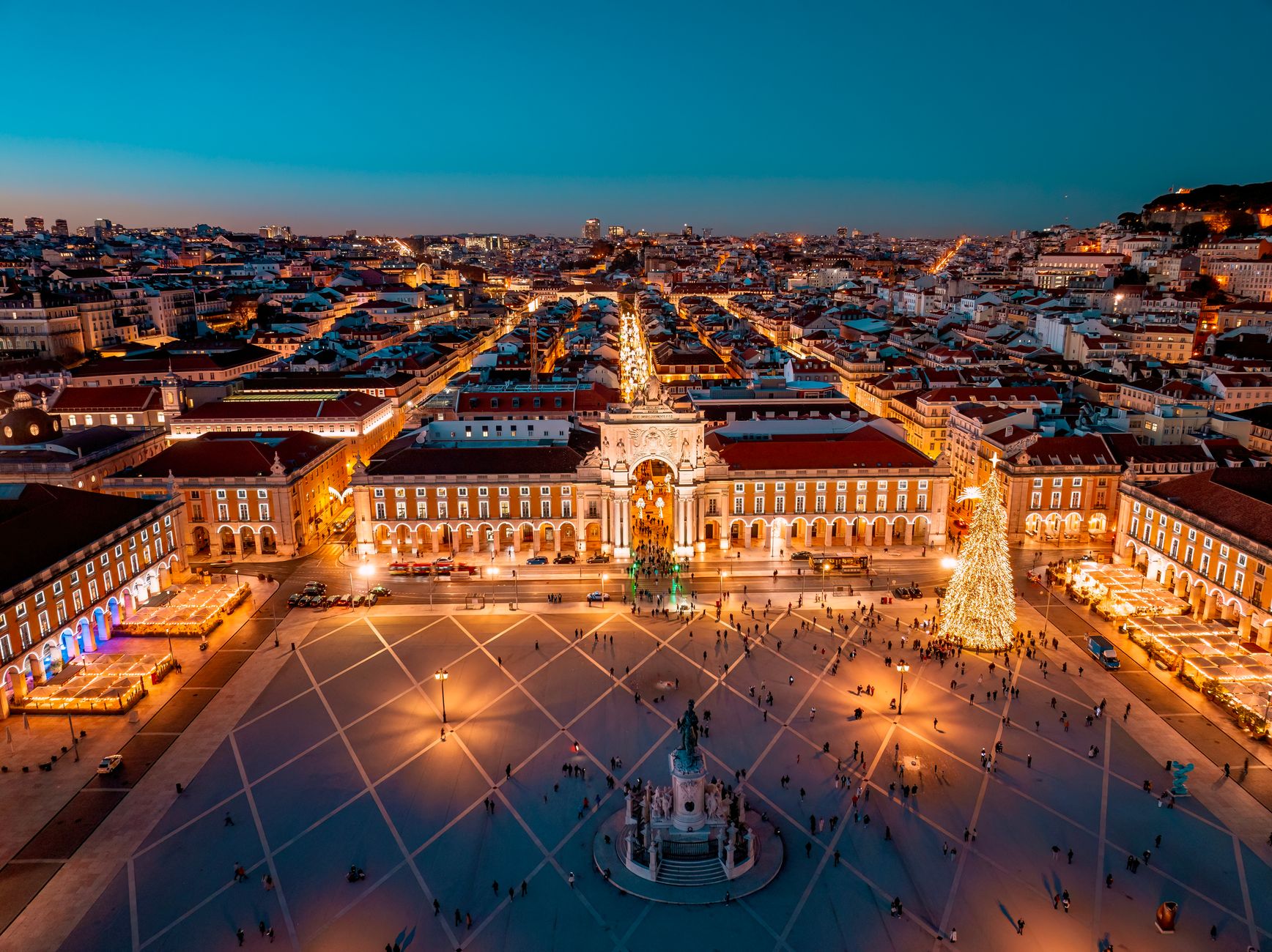 Aerial view of Praça do Comércio Lisbon illuminated at night with holiday decorations