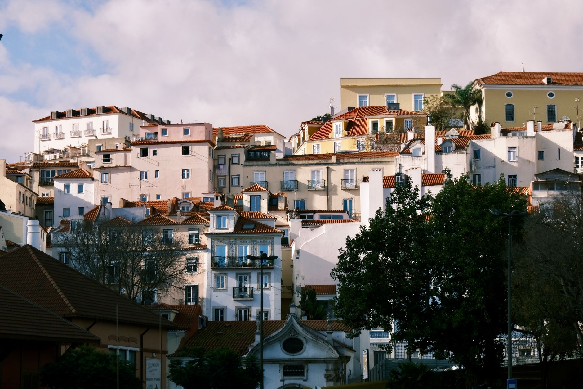 Lisbon residential rooftops and red tiles in a central neighborhood