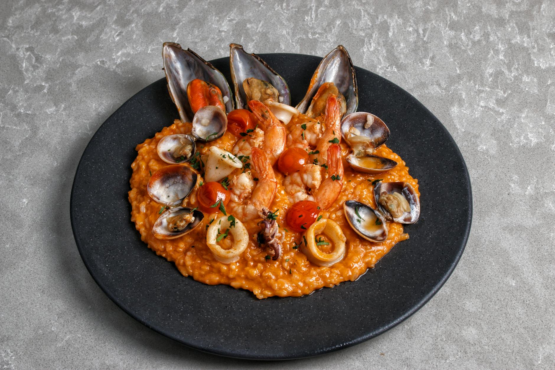 Seafood rice arroz de mariscos with prawns clams and mussels Portugal