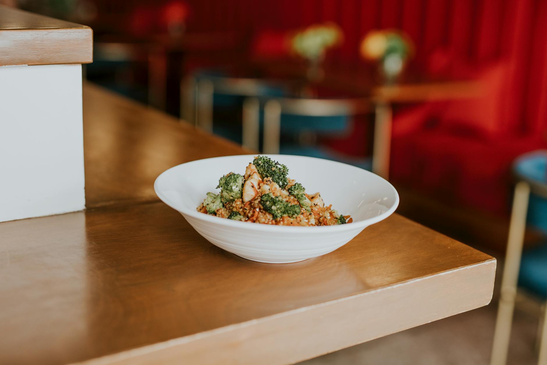 Vegan couscous salad with broccoli and tofu served in a modern Lisbon cafe