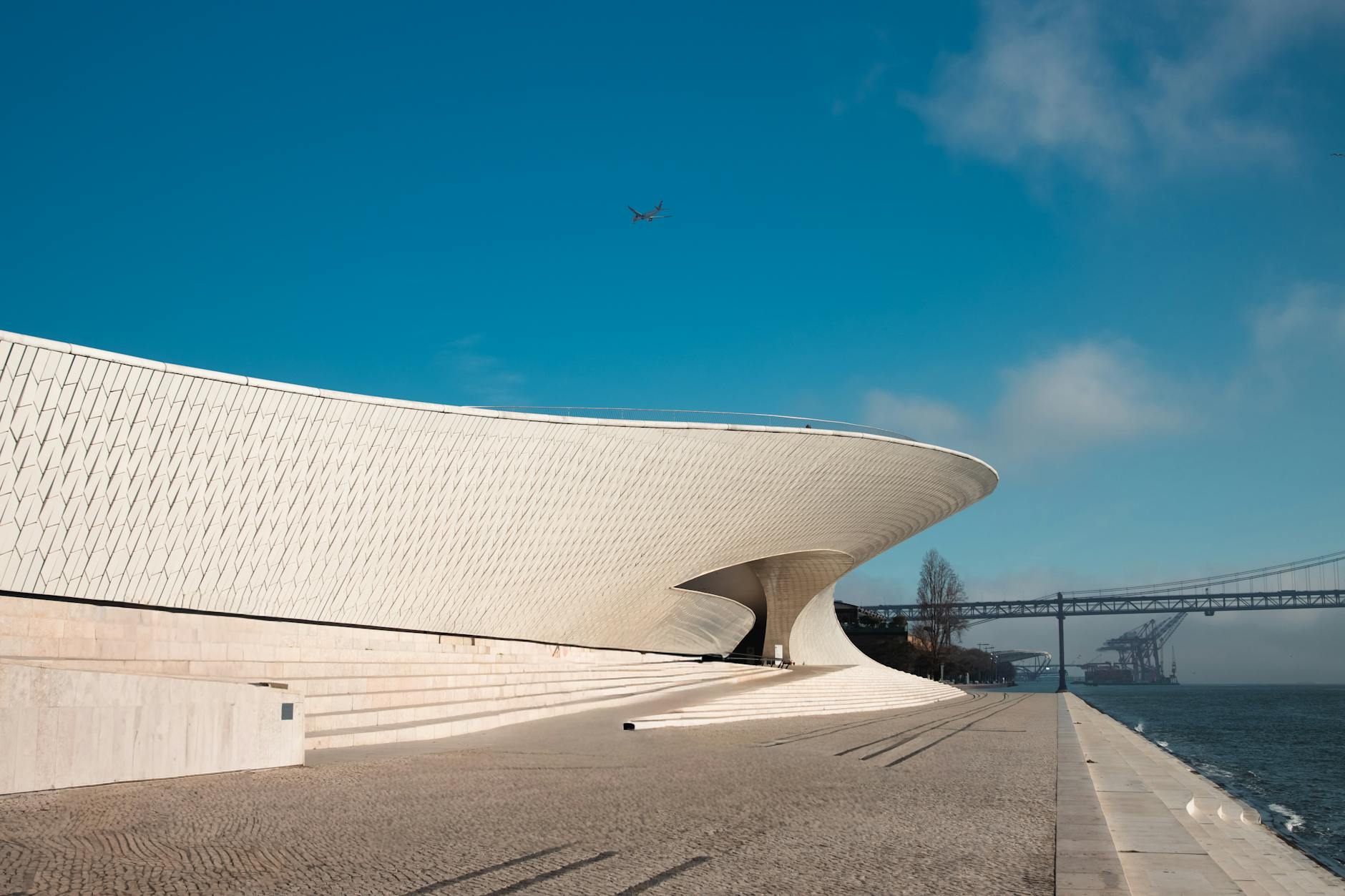 MAAT museum Lisbon curved white ceramic tile facade designed by Amanda Levete