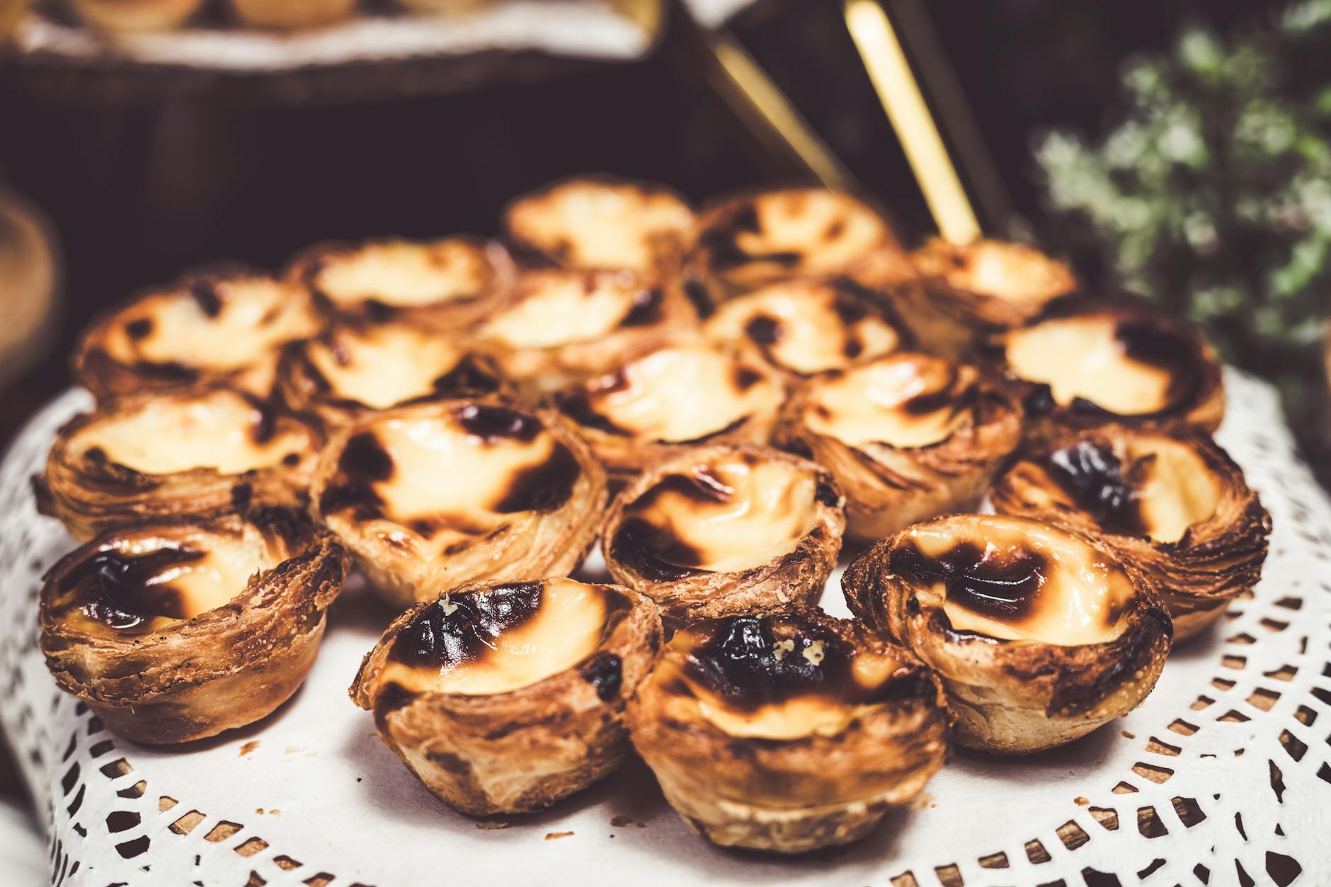 Close-up of golden pastéis de nata Portuguese custard tarts fresh from the oven