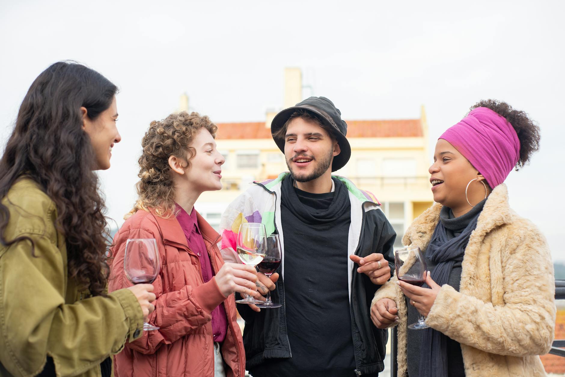 Group of friends enjoying a wine tasting outdoors in Portugal