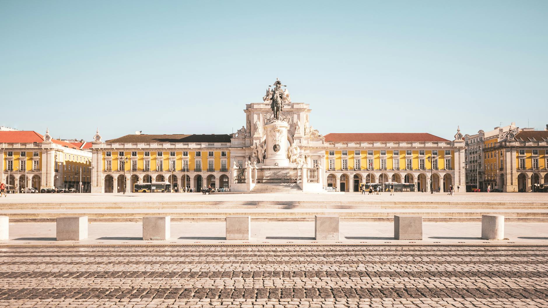 Wide view of Praça do Comércio with iconic Rua Augusta Arch architecture, Lisbon