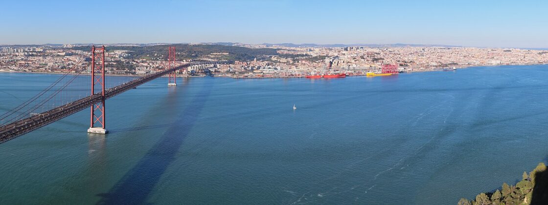 Panoramic view of Lisbon and the 25 de Abril Bridge seen from Cristo Rei on the south bank of the Tagus
