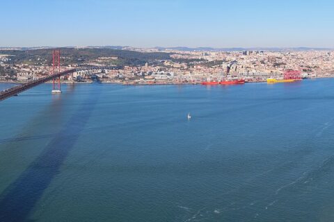 Panoramic view of Lisbon and the 25 de Abril Bridge seen from Cristo Rei on the south bank of the Tagus
