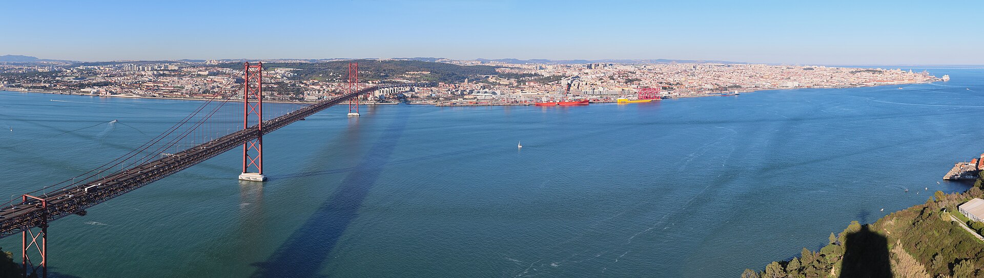 Panoramic view of Lisbon and the 25 de Abril Bridge seen from Cristo Rei on the south bank of the Tagus