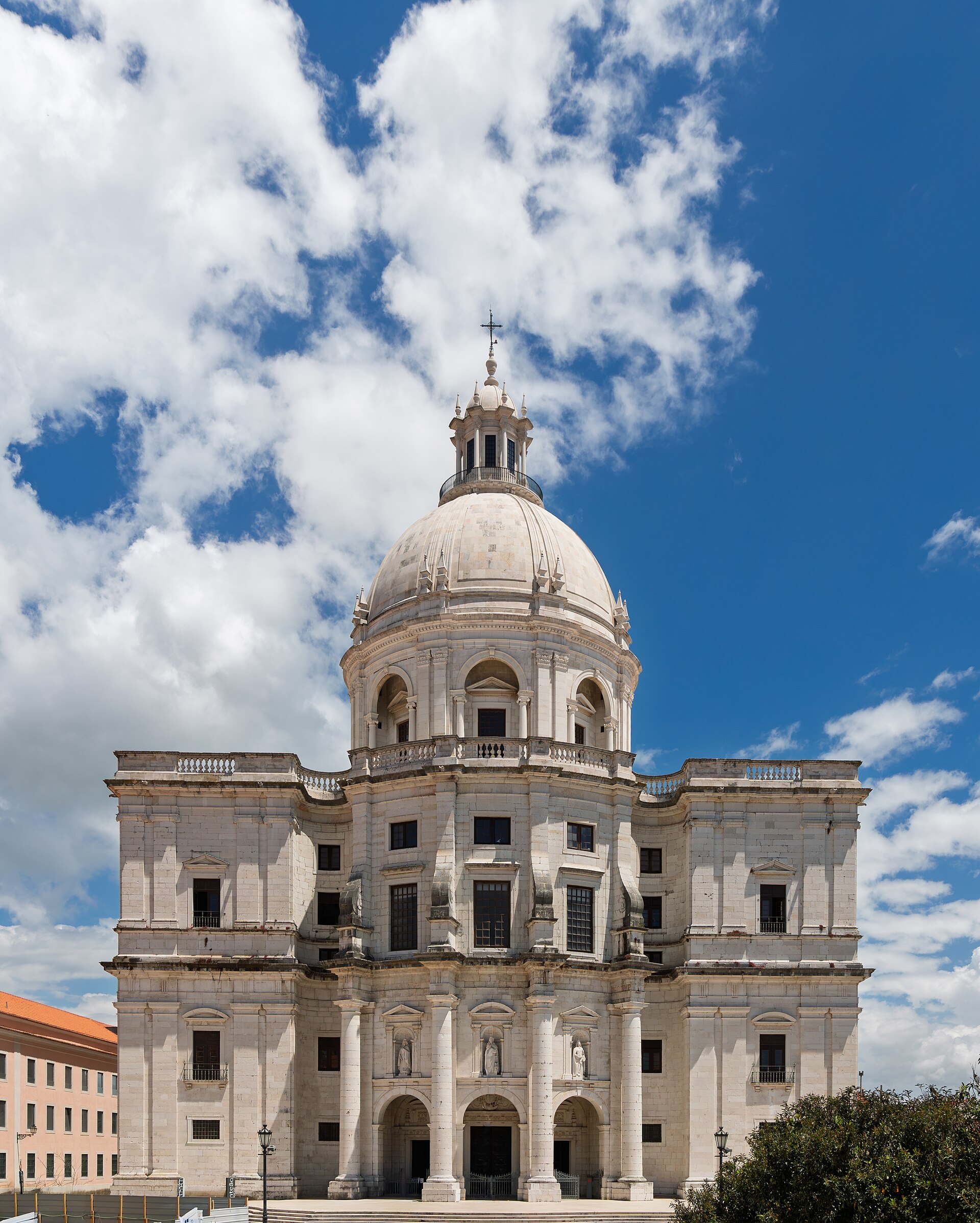 The Baroque facade and dome of the Panteao Nacional in Lisbon against a blue sky