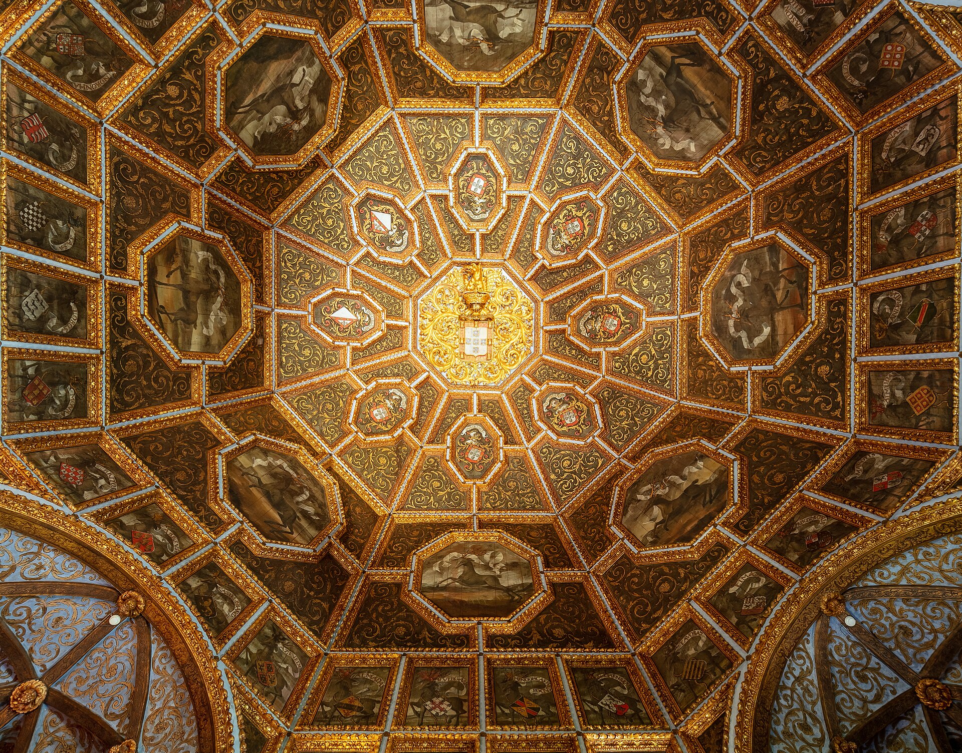 The gilded octagonal coffered ceiling of the Sala dos Brasões, painted with the coats of arms of Portuguese noble families around a central royal shield