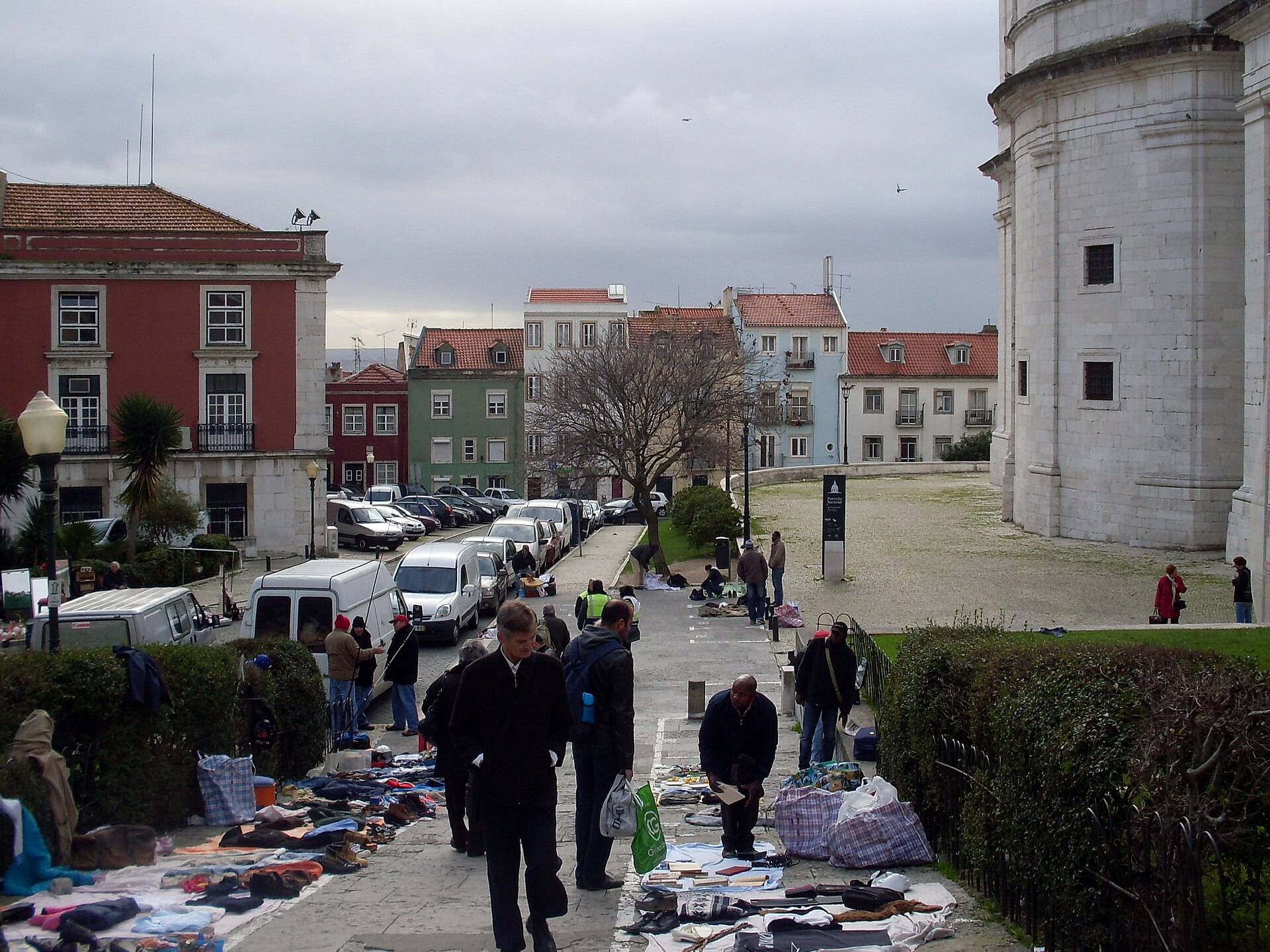 Blankets of secondhand goods line the steps beside Lisbon’s National Pantheon during Feira da Ladra.